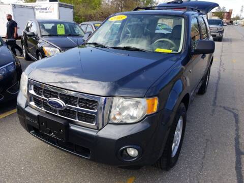 2008 Ford Escape for sale at Howe's Auto Sales in Lowell MA