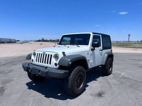2009 Jeep Wrangler for sale at Classic Car Deals in Cadillac MI