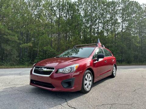 2014 Subaru Impreza for sale at Drive 1 Auto Sales in Wake Forest NC