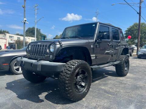 2016 Jeep Wrangler Unlimited for sale at Apex Knox Auto in Knoxville TN
