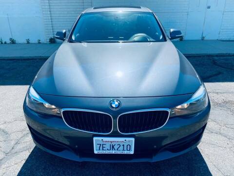 2014 BMW 3 Series for sale at E and M Auto Sales in Bloomington CA