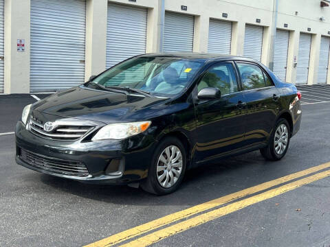 2013 Toyota Corolla for sale at IRON CARS in Hollywood FL