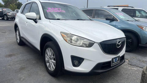 2013 Mazda CX-5 for sale at CE Auto Sales in Baytown TX