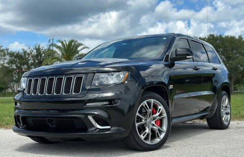 2012 Jeep Grand Cherokee for sale at PennSpeed in New Smyrna Beach FL