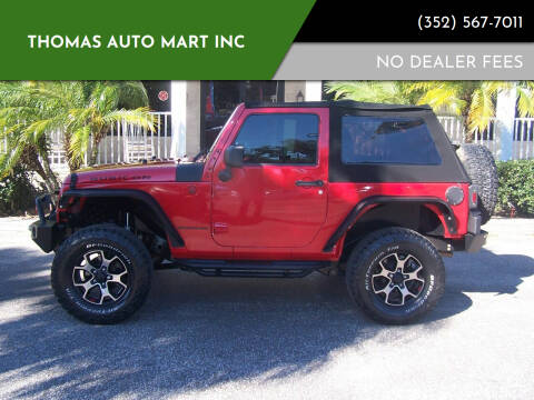 2014 Jeep Wrangler for sale at Thomas Auto Mart Inc in Dade City FL