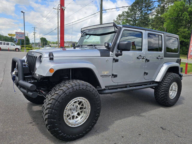 Used 2014 Jeep Wrangler Unlimited Sahara with VIN 1C4BJWEG5EL145409 for sale in Kingsport, TN