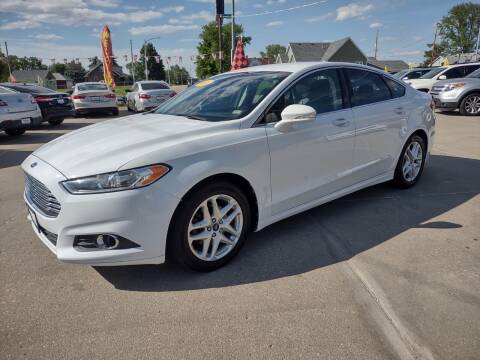 2014 Ford Fusion for sale at Triangle Auto Sales 2 in Omaha NE