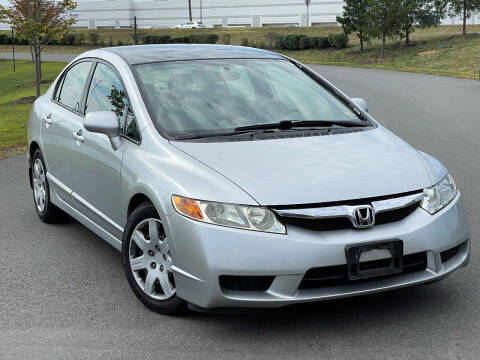 2009 Honda Civic for sale at BOOST MOTORS LLC in Sterling VA