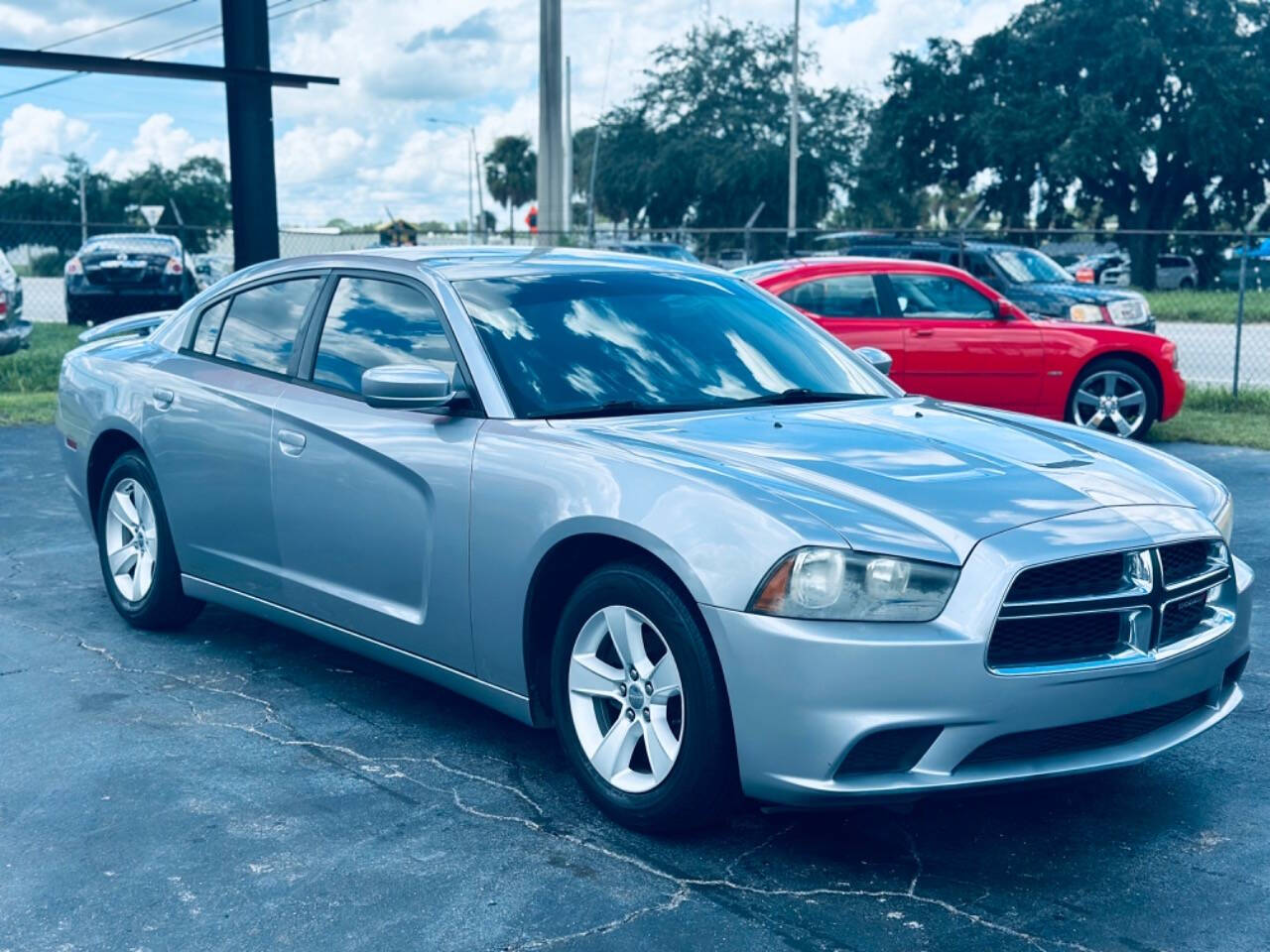 2013 Dodge Charger for sale at NOVA AUTO SALES in Orlando, FL