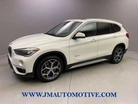 2018 BMW X1 for sale at J & M Automotive in Naugatuck CT
