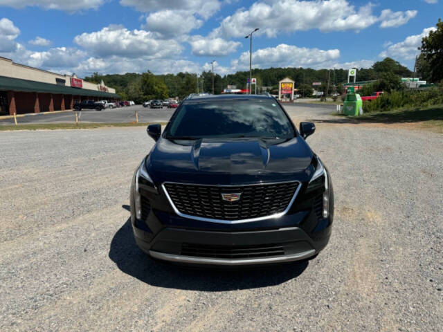 2021 Cadillac XT4 for sale at Guadalupe Auto Sales, LLC. in Jemison, AL