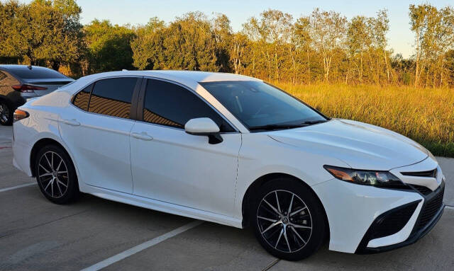 2021 Toyota Camry for sale at CAR MARKET AUTO GROUP in Sugar Land, TX