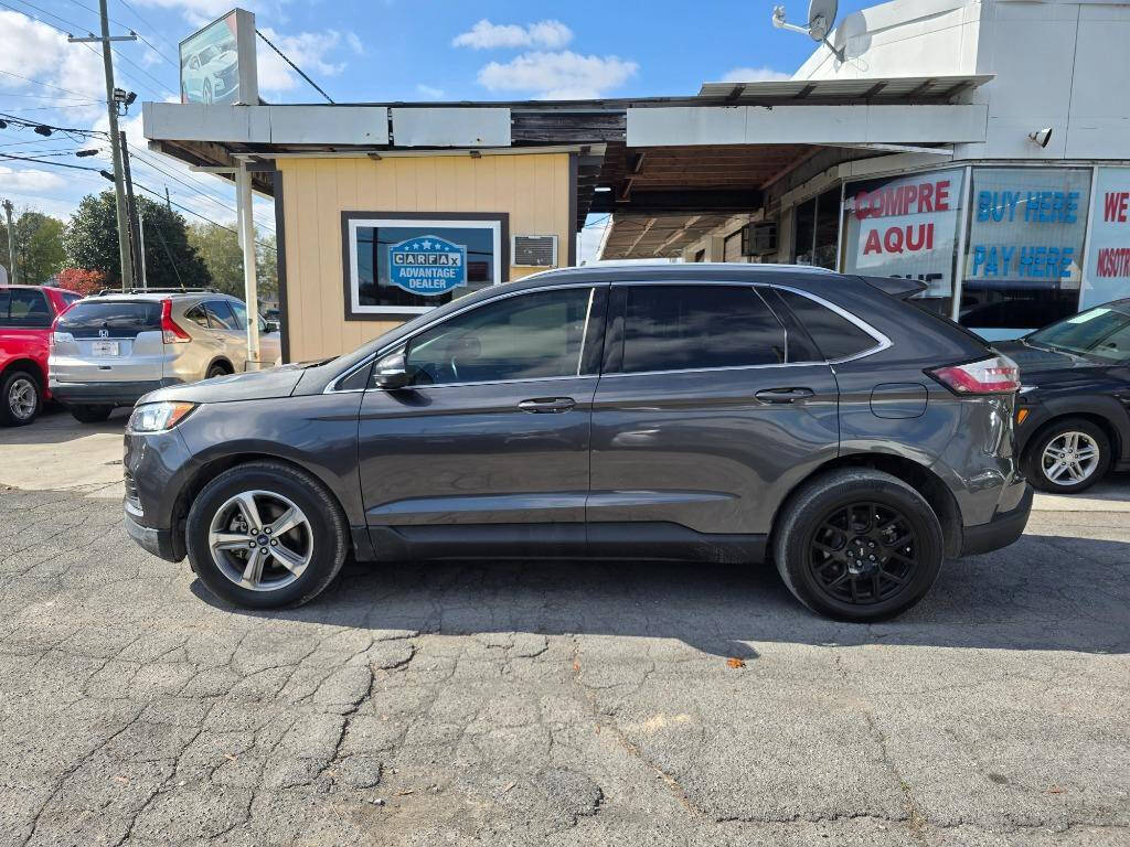 2020 Ford Edge for sale at DAGO'S AUTO SALES LLC in Dalton, GA