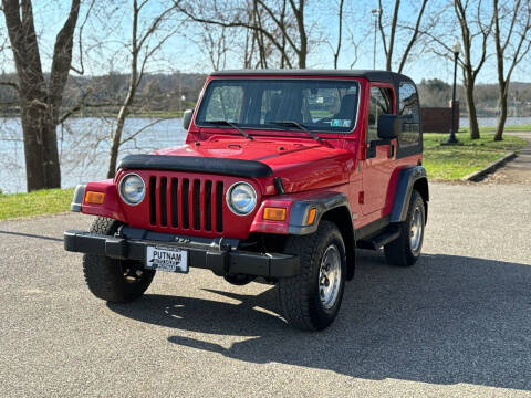 2004 Jeep Wrangler for sale at PUTNAM AUTO SALES INC in Marietta OH