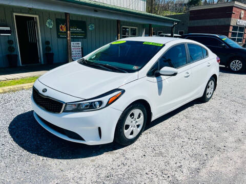 2017 Kia Forte for sale at Booher Motor Company in Marion VA