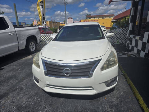 2014 Nissan Altima for sale at Import & Export Auto Sales in Hialeah FL