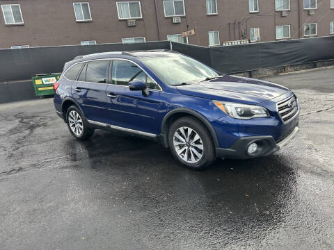 2017 Subaru Outback for sale at McManus Motors in Wheat Ridge CO