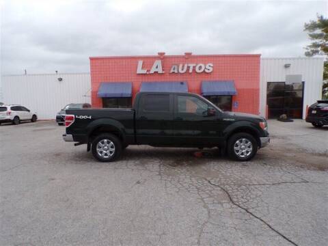 2013 Ford F-150 for sale at L A AUTOS in Omaha NE