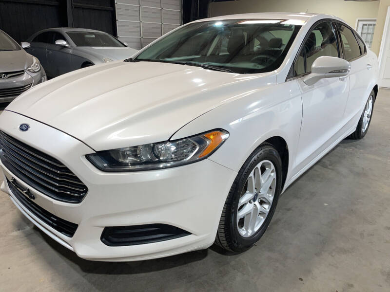 2015 Ford Fusion for sale at Safe Trip Auto Sales in Dallas TX