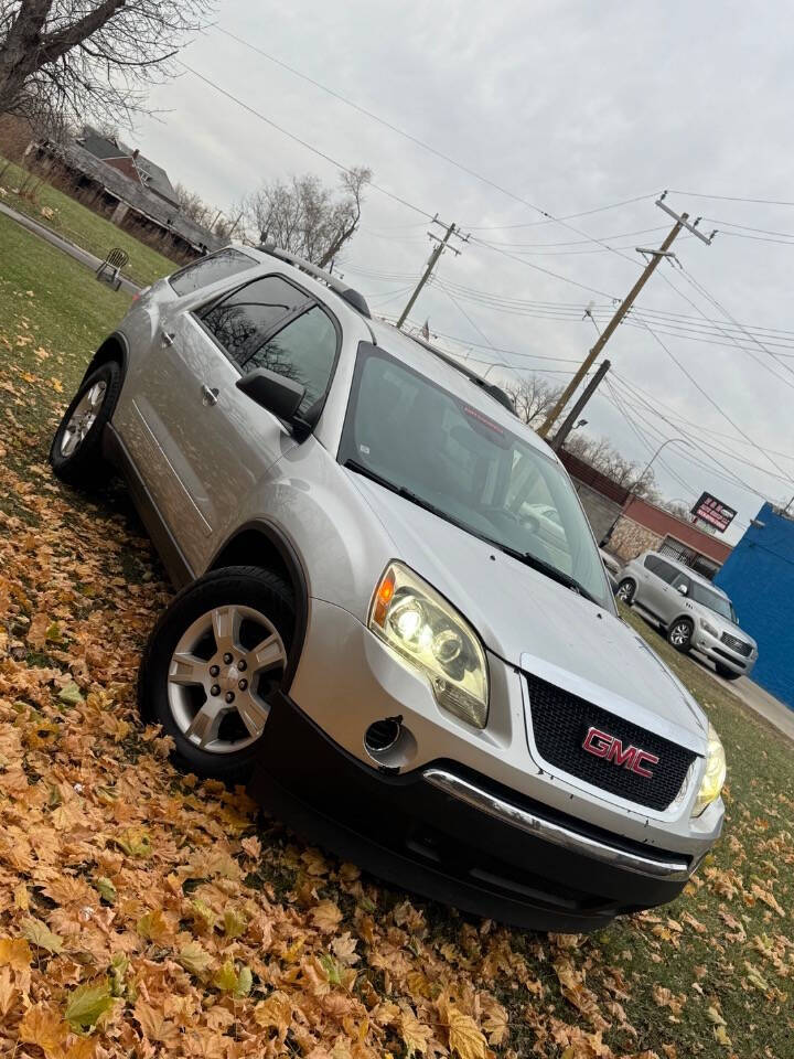 2011 GMC Acadia for sale at H & H AUTO GROUP in Detroit, MI