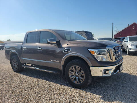 2017 Nissan Titan for sale at BERKENKOTTER MOTORS in Brighton CO