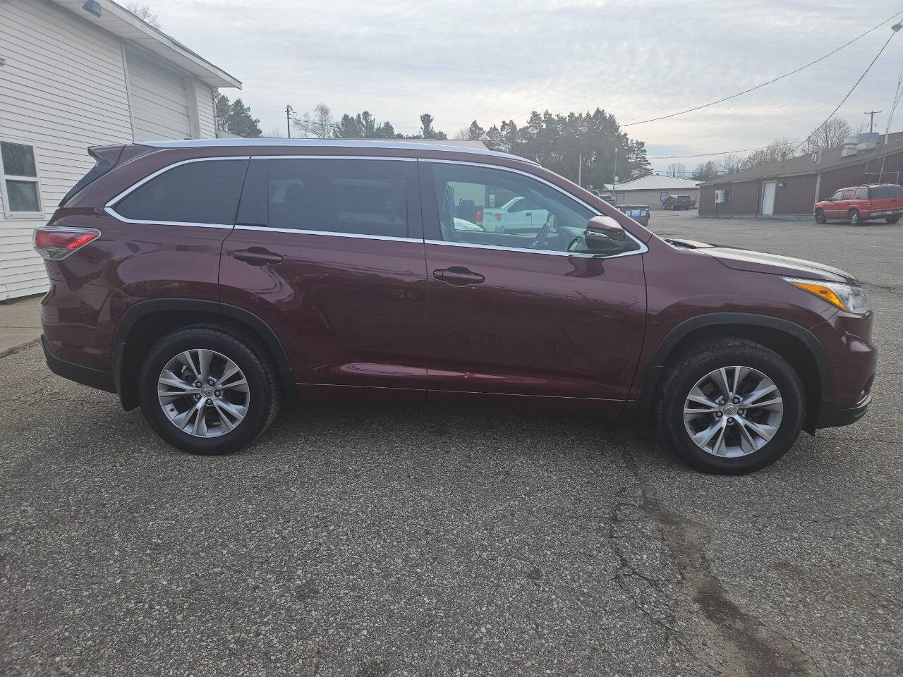 2015 Toyota Highlander for sale at DANGO AUTO SALES in HOWARD CITY, MI