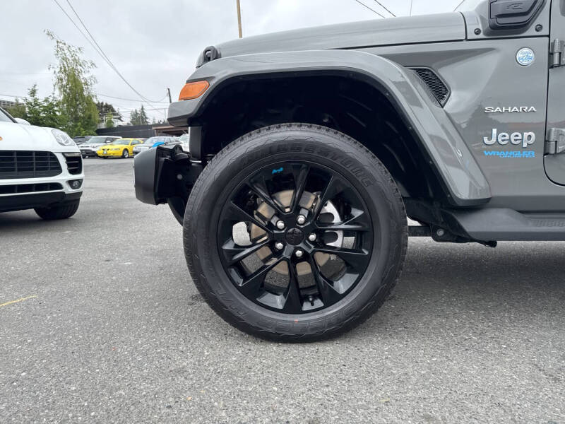 Used 2022 Jeep Wrangler Unlimited Sahara 4XE with VIN 1C4JJXP65NW214040 for sale in Edmonds, WA