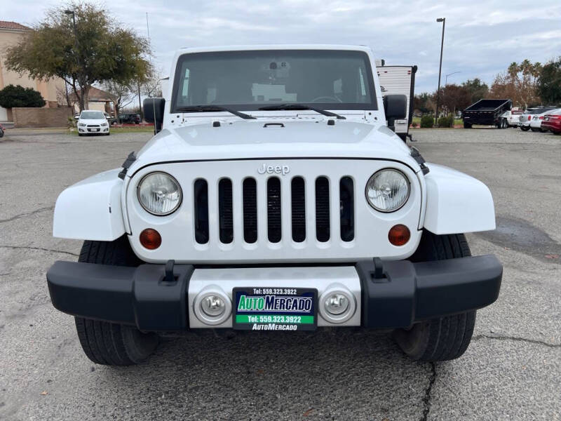 Used 2013 Jeep Wrangler Unlimited Sahara with VIN 1C4HJWEG5DL639858 for sale in Clovis, CA