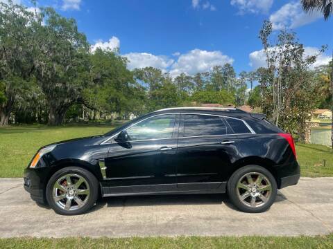 2010 Cadillac SRX for sale at Louie's Auto Sales in Leesburg FL
