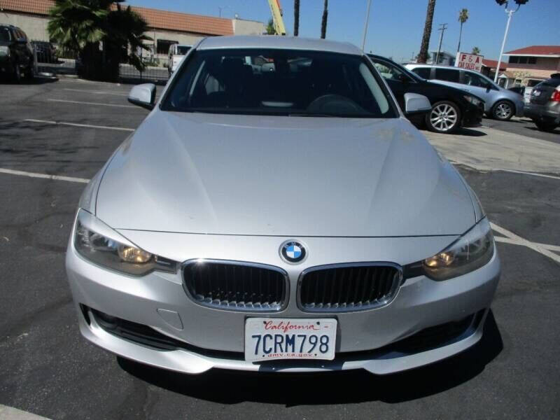 2014 BMW 3 Series for sale at Unique Auto Sales, Inc. in Bell, CA