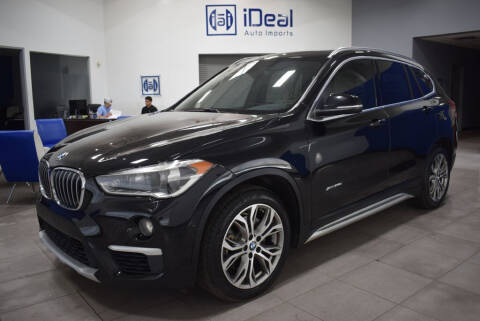 2016 BMW X1 for sale at iDeal Auto Imports in Eden Prairie MN