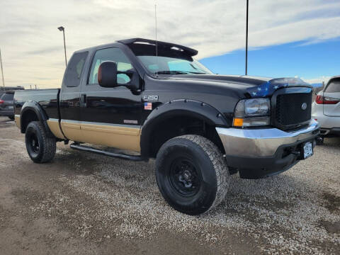 2004 Ford F-250 Super Duty for sale at BERKENKOTTER MOTORS in Brighton CO