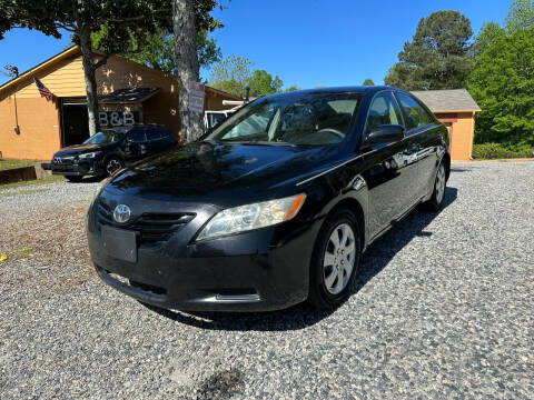 2009 Toyota Camry for sale at Efficiency Auto Buyers in Milton GA