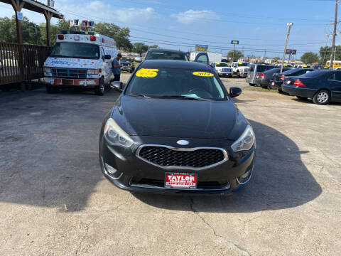 2014 Kia Cadenza for sale at Taylor Trading Co in Beaumont TX