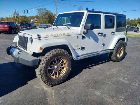 2014 Jeep Wrangler Unlimited for sale at Cruisin' Auto Sales in Madison IN