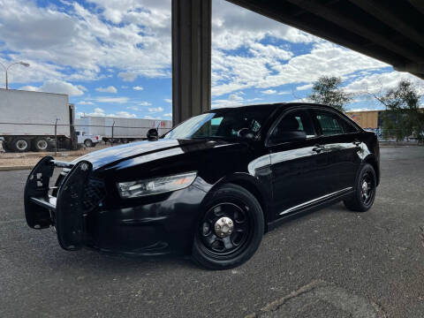 2014 Ford Taurus for sale at MT Motor Group LLC in Phoenix AZ