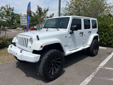 2015 Jeep Wrangler Unlimited for sale at Bay City Autosales in Tampa FL