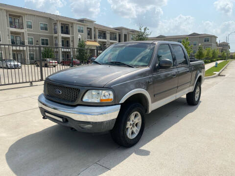 2003 Ford F-150 for sale at KM Motors LLC in Houston TX