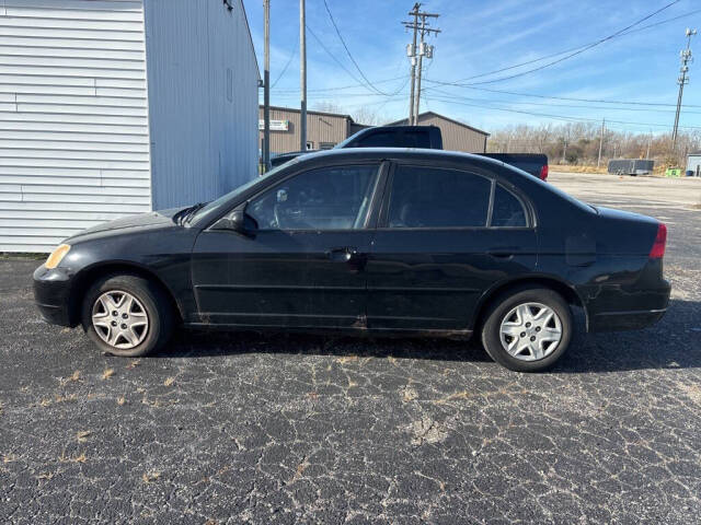 2003 Honda Civic for sale at DECKER AUTO SALES in Bay City, MI