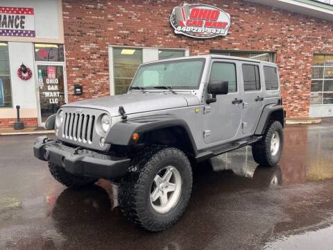 2015 Jeep Wrangler Unlimited for sale at Ohio Car Mart in Elyria OH