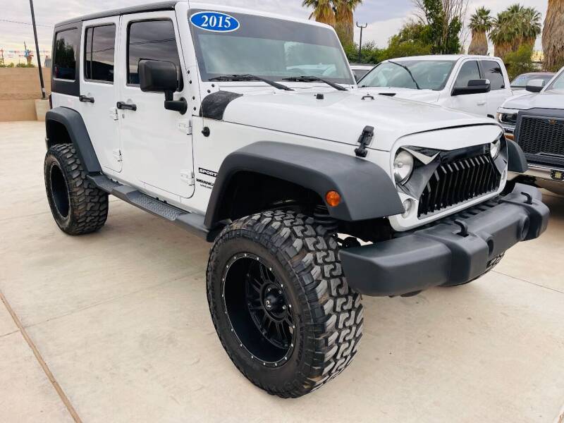 2015 Jeep Wrangler Unlimited for sale at A AND A AUTO SALES in Gadsden AZ