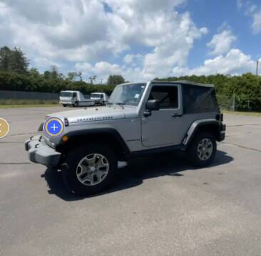 2014 Jeep Wrangler for sale at Riverside Auto Sales & Service in Portland ME