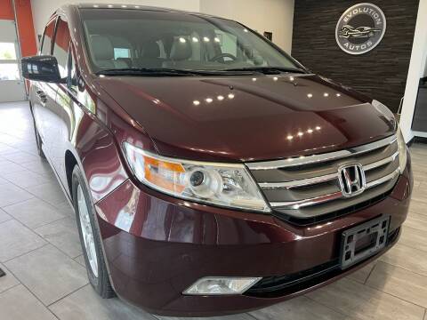 2012 Honda Odyssey for sale at Evolution Autos in Whiteland IN