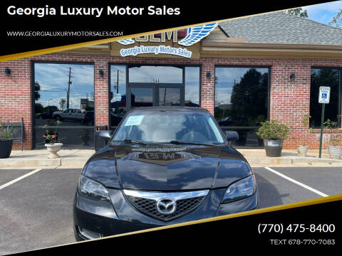 2009 Mazda MAZDA3 for sale at Georgia Luxury Motor Sales in Cumming GA