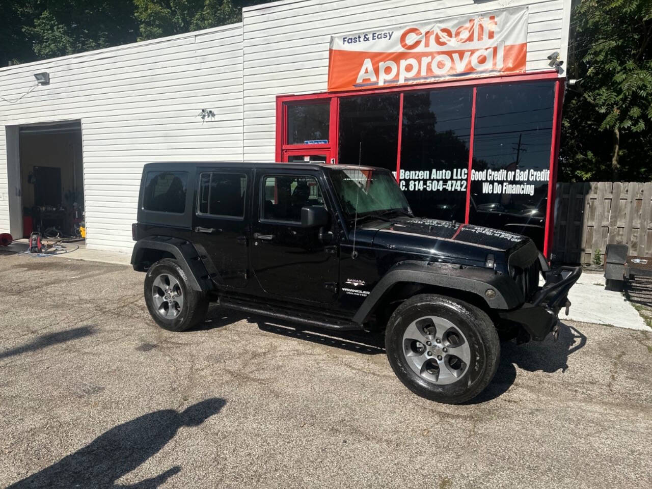 2016 Jeep Wrangler Unlimited for sale at BENZEN AUTO LLC in Ashtabula, OH