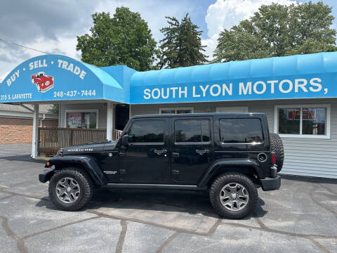 2013 Jeep Wrangler Unlimited for sale at South Lyon Motors INC in South Lyon MI