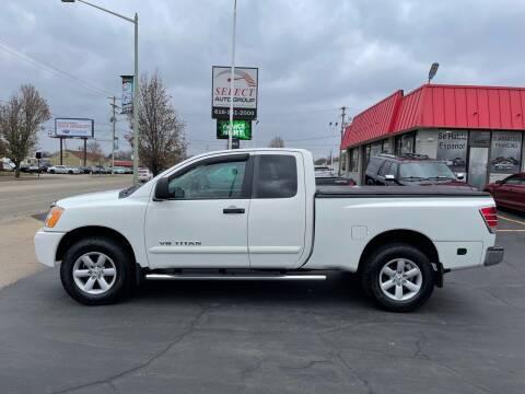 2011 Nissan Titan for sale at Select Auto Group in Wyoming MI