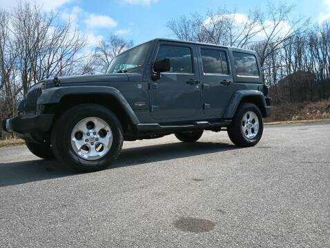2015 Jeep Wrangler Unlimited for sale at Mitchell Hill Motors in Butler PA
