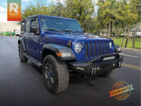 2018 Jeep Wrangler Unlimited for sale at Rolling Cars LLC in West Park FL