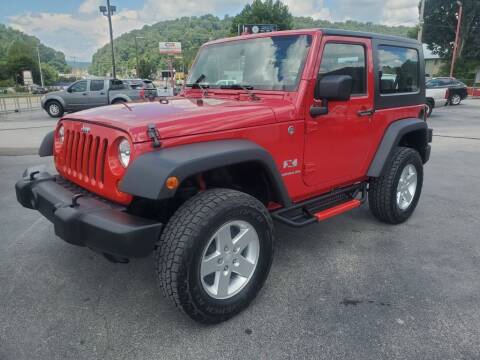 2007 Jeep Wrangler for sale at MCMANUS AUTO SALES in Knoxville TN